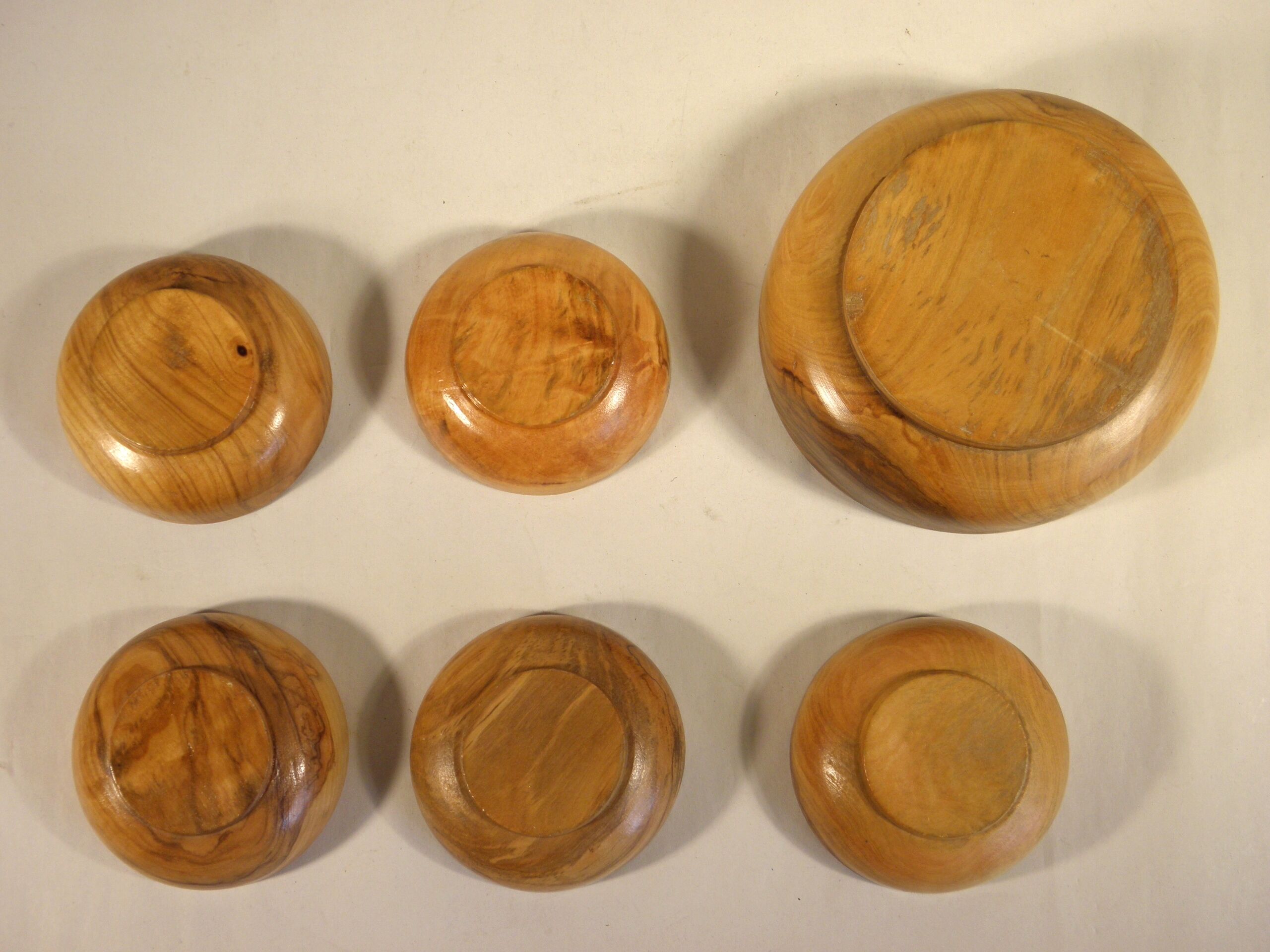 Six olive wood cups