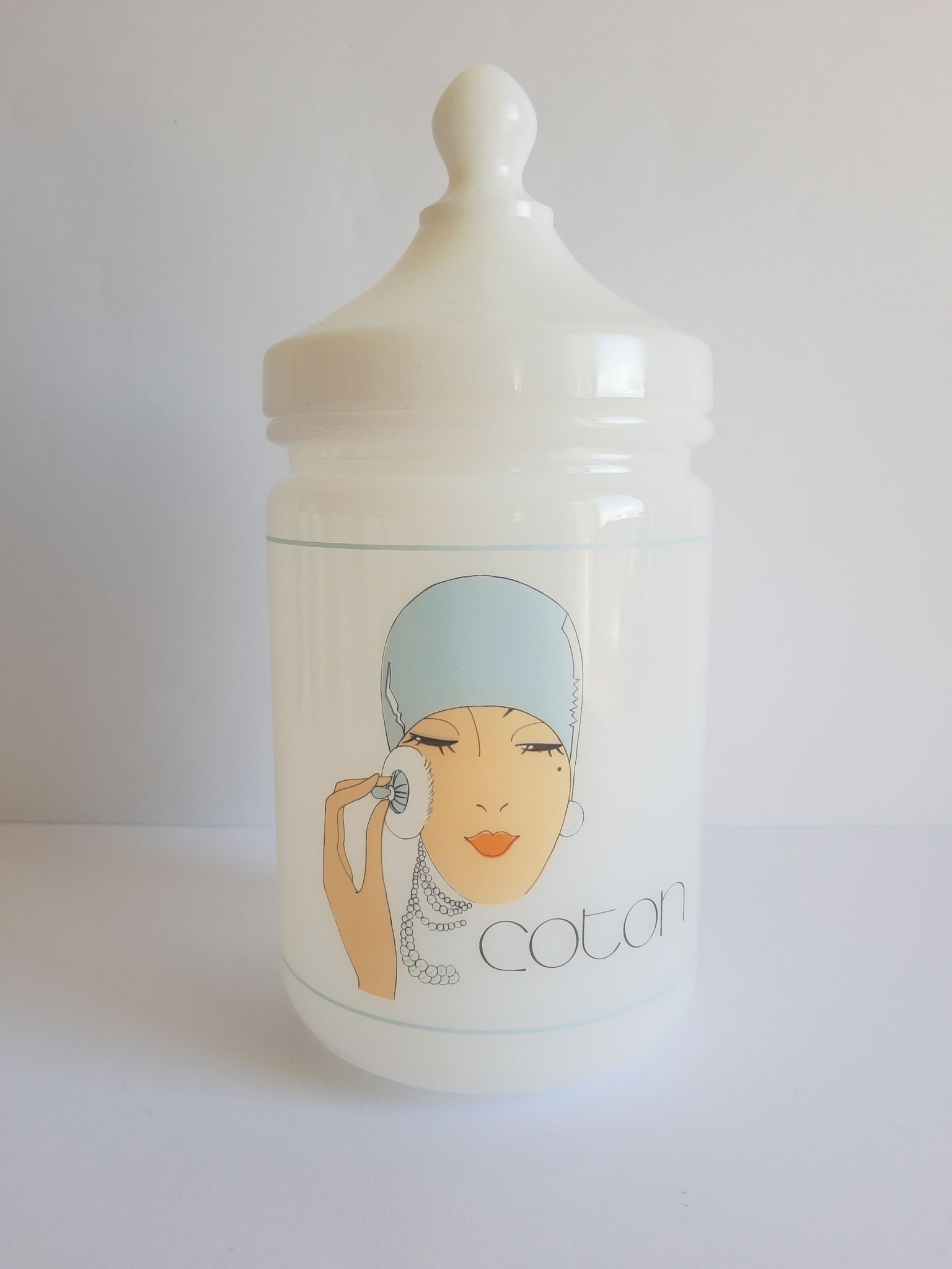 Old cotton bathroom pot in vintage opal year 1970