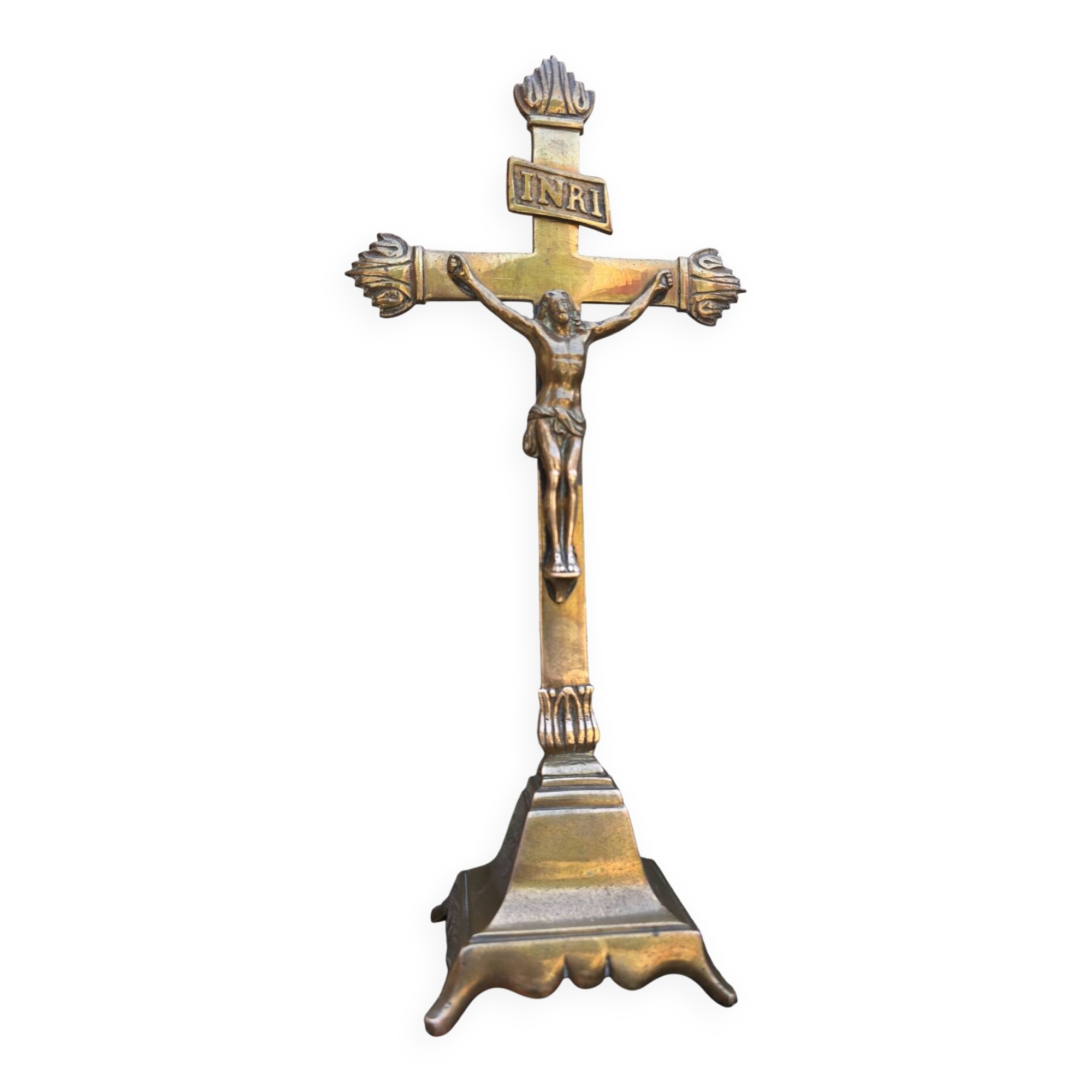 19th-century brass crucifix on a base