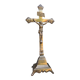 19th-century brass crucifix on a base