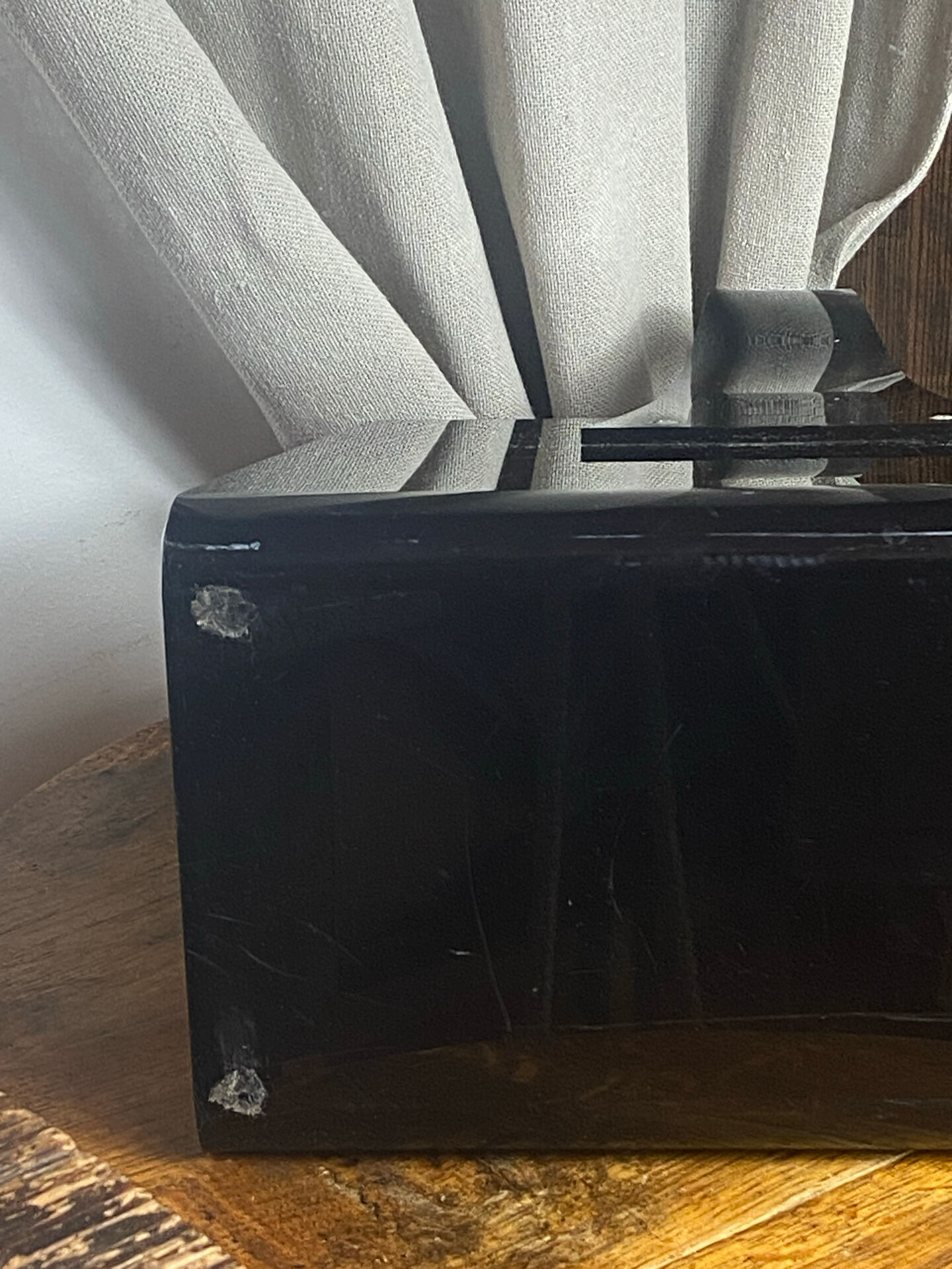 Black plexiglass magazine rack