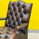 Fauteuil Chesterfield en cuir marron (le prix est pour un)