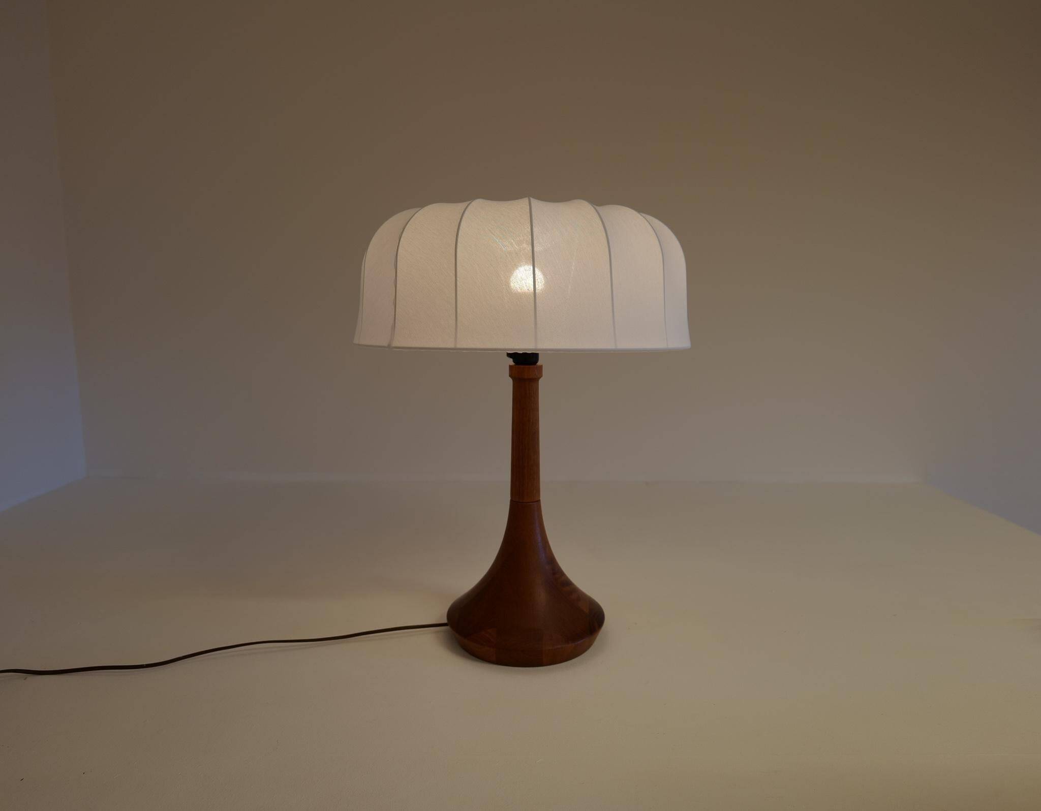 Mid-century table lamp in solid teak by Lisbeth Brams, Denmark, 1960s.