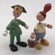 Set of 2 vintage GOULA wooden toy figurines with spring.