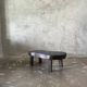 Small old Asian wooden coffee table in Japanese style, kidney-shaped top