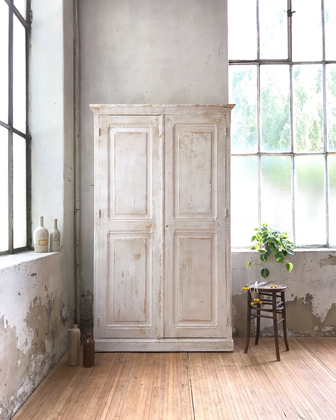 Antique wardrobe in patinated pine