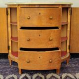 Half-moon commode in burl wood with a marble top.