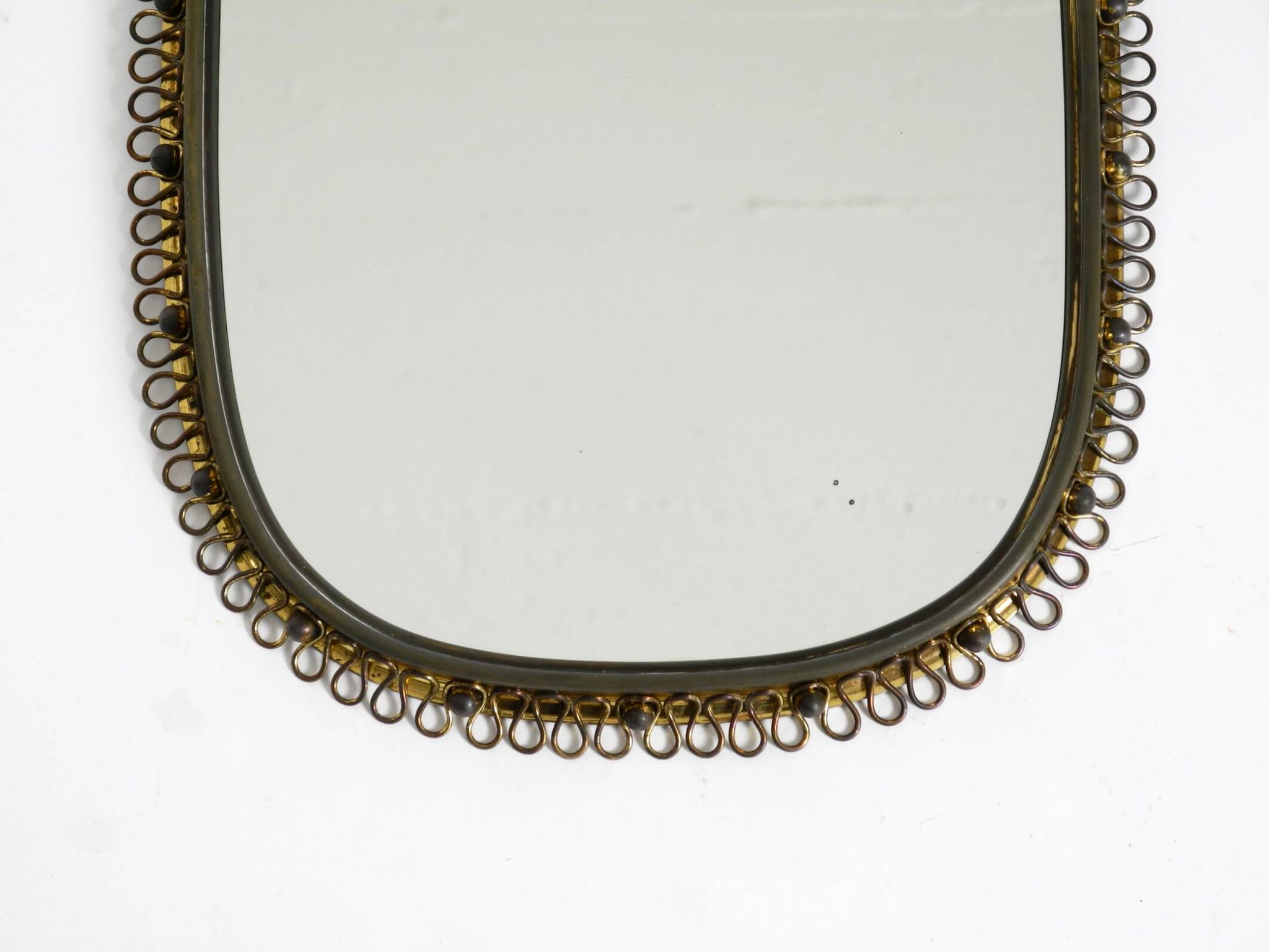 Mid century brass wall mirror by Josef Frank for Svenskt Tenn Sweden
