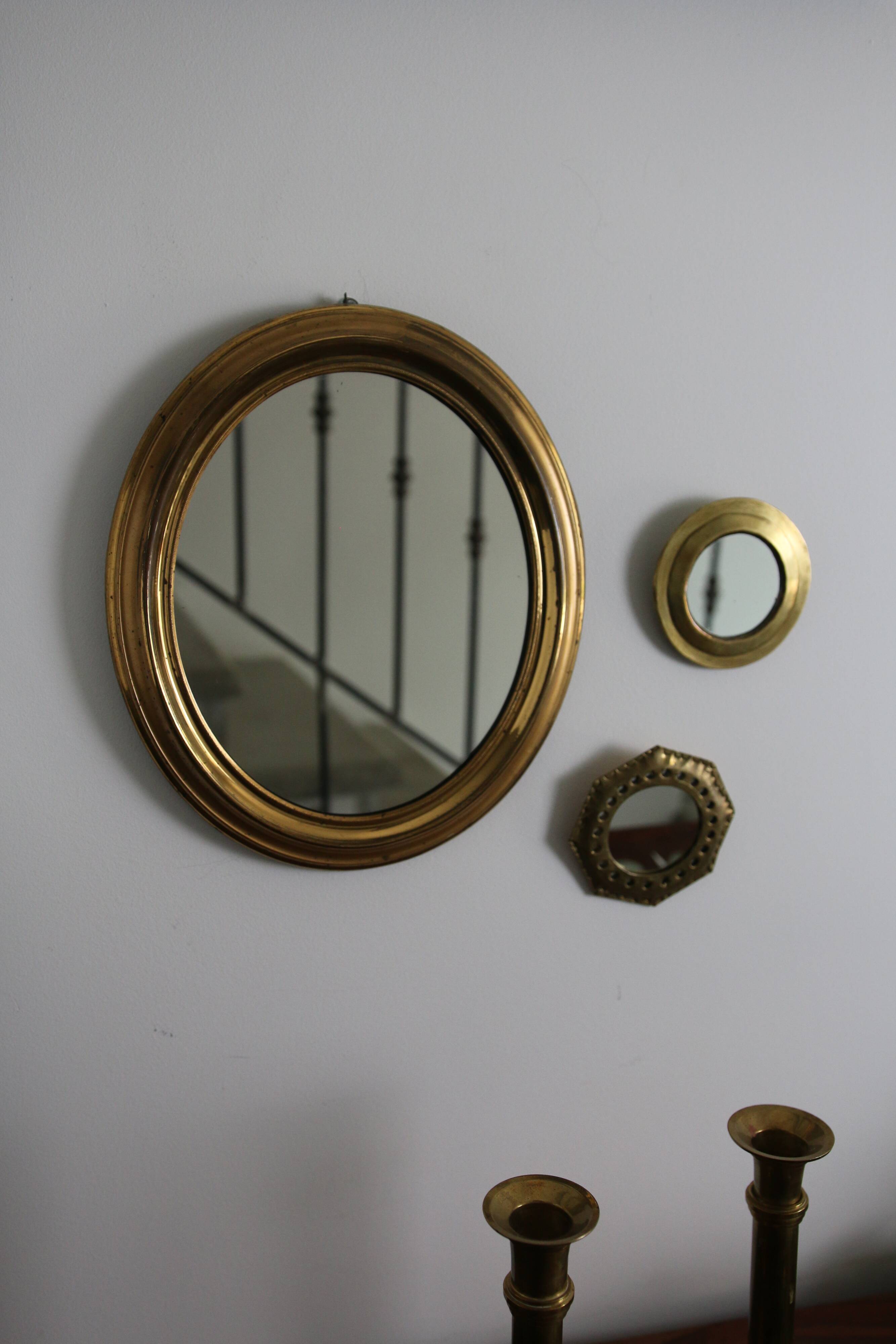 Oval brass mirror
