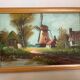 Small village painting with a mill, oil on canvas, signed.