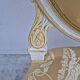 Louis XVI style cabriolet armchair with decorated medallion