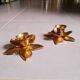 Brass flower candlesticks, 1970.