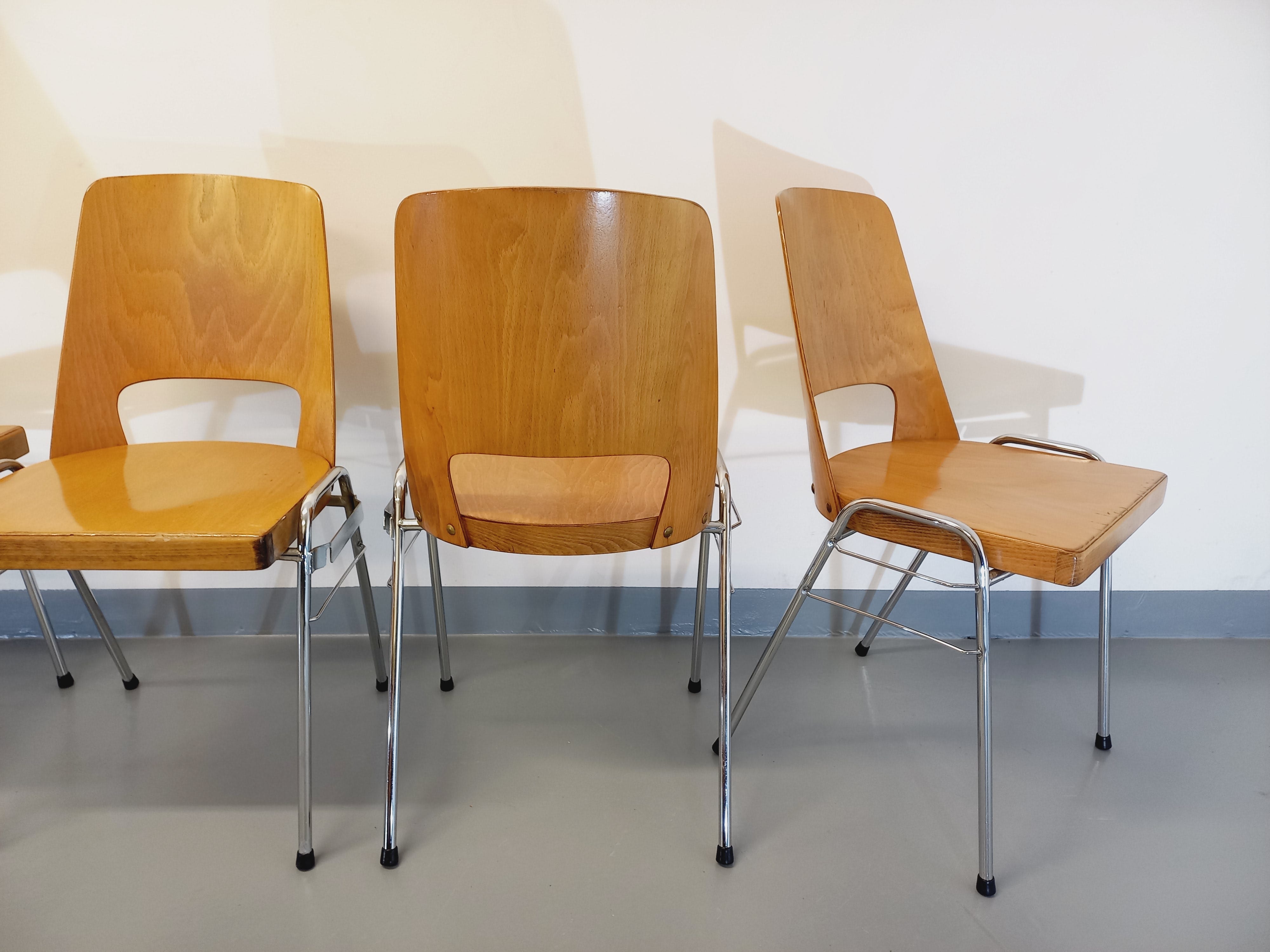 4 vintage stackable chairs model barrel Manhattan brand Baumann brand 70s