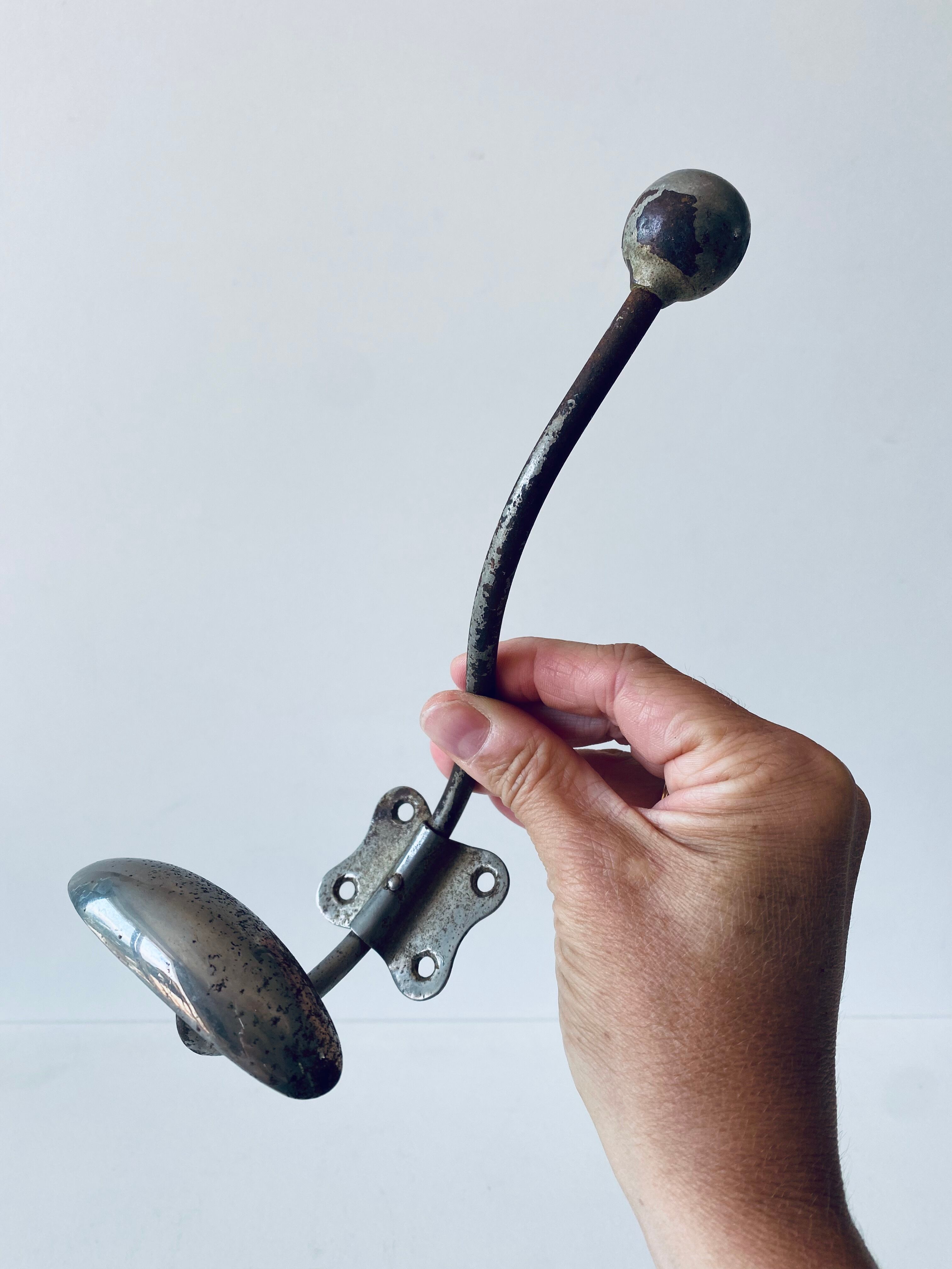 Ancient metal patère