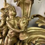 Paire de chenêts en bronze ciselé et doré d'après un modèle de Jacques Caffieri, Paris XIXème