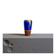 Electric blue and frosted brown decorative vase with gold leaf.
