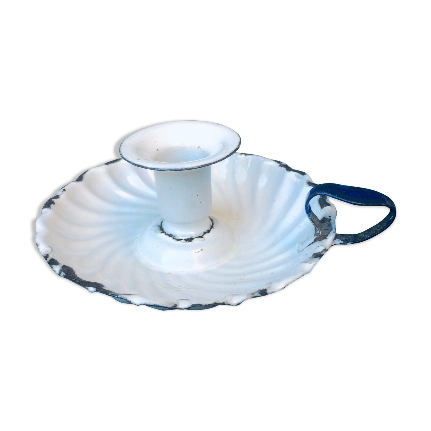 Old white enamelled candlestick