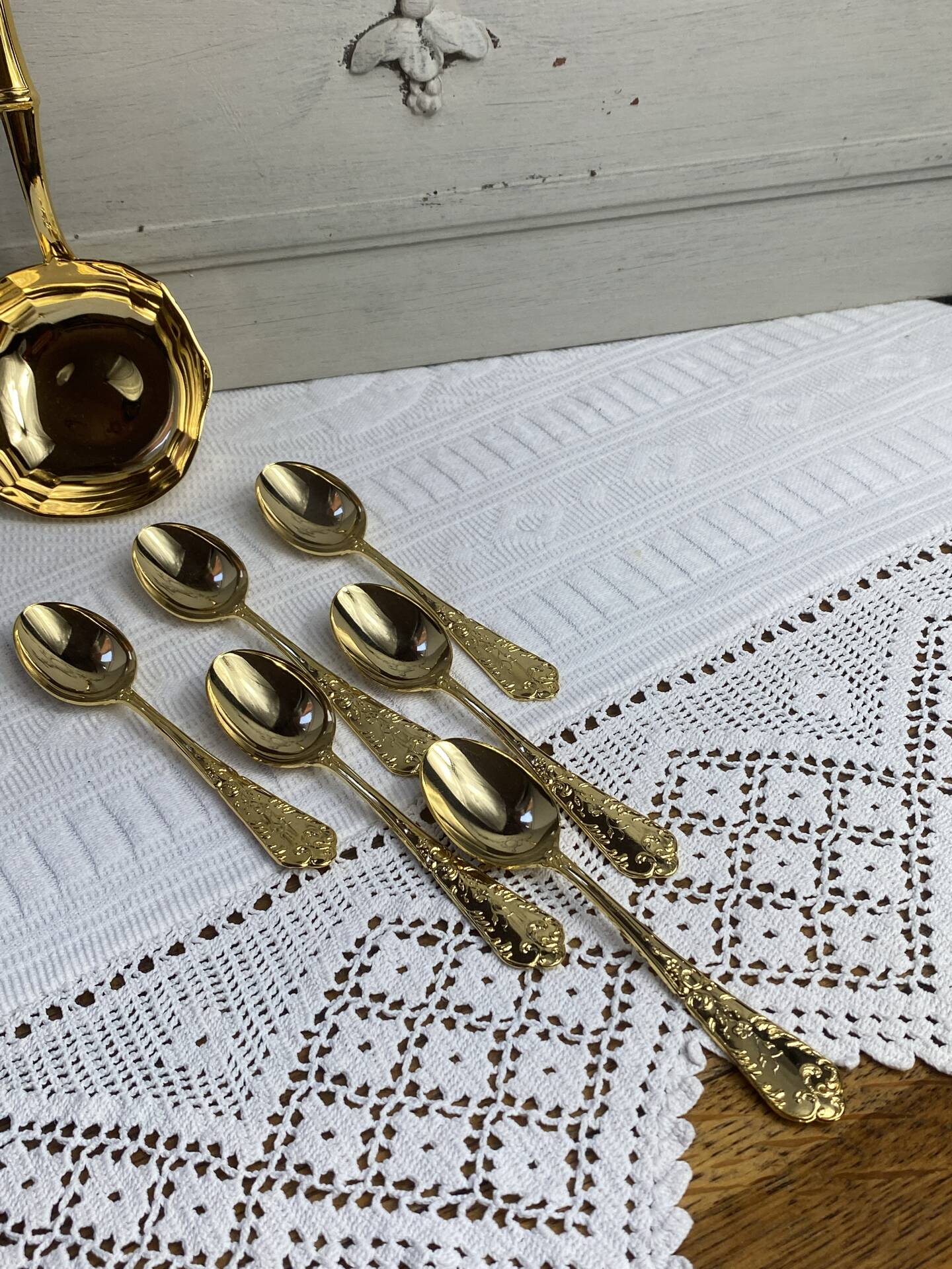 Dessert spoons and serving ladle