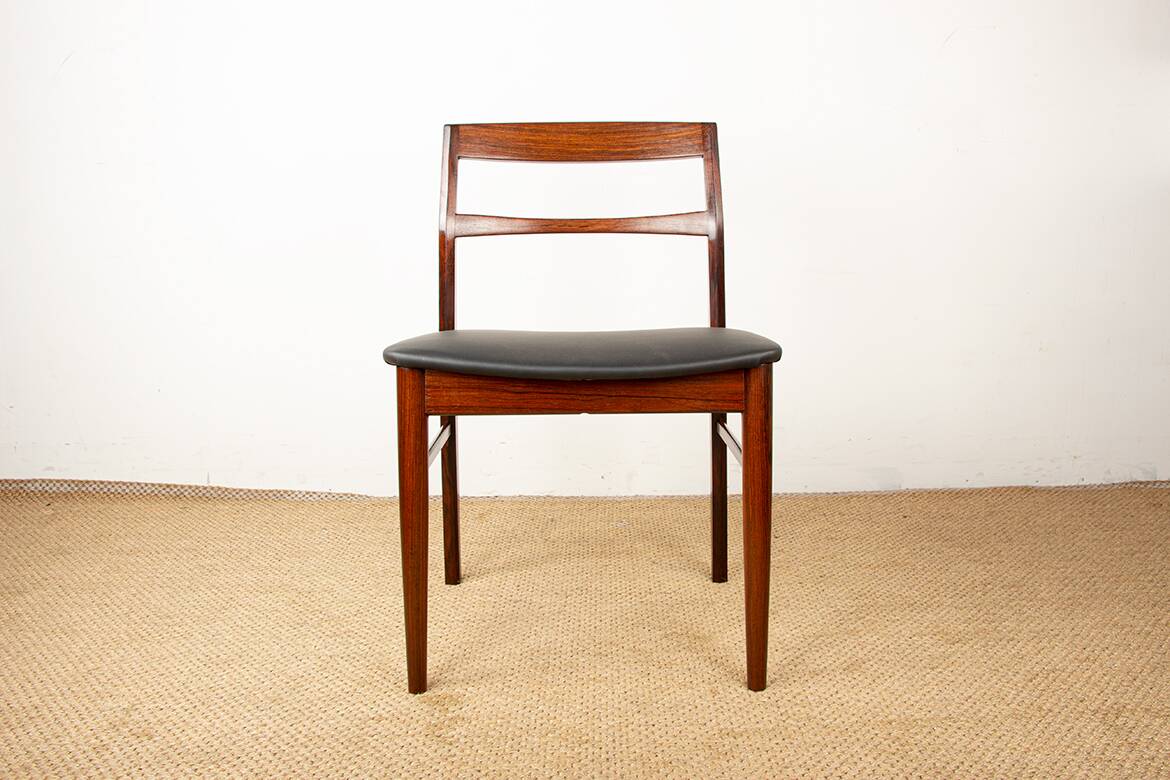 4 Danish chairs in rosewood and new leatherette by Henning Kjaernulf 1960.
