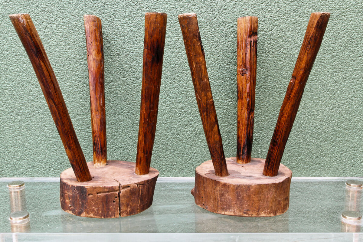 Pair of brutalist stools, tripods