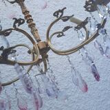 Antique chandelier with its papillae, reflection changing according to exposure