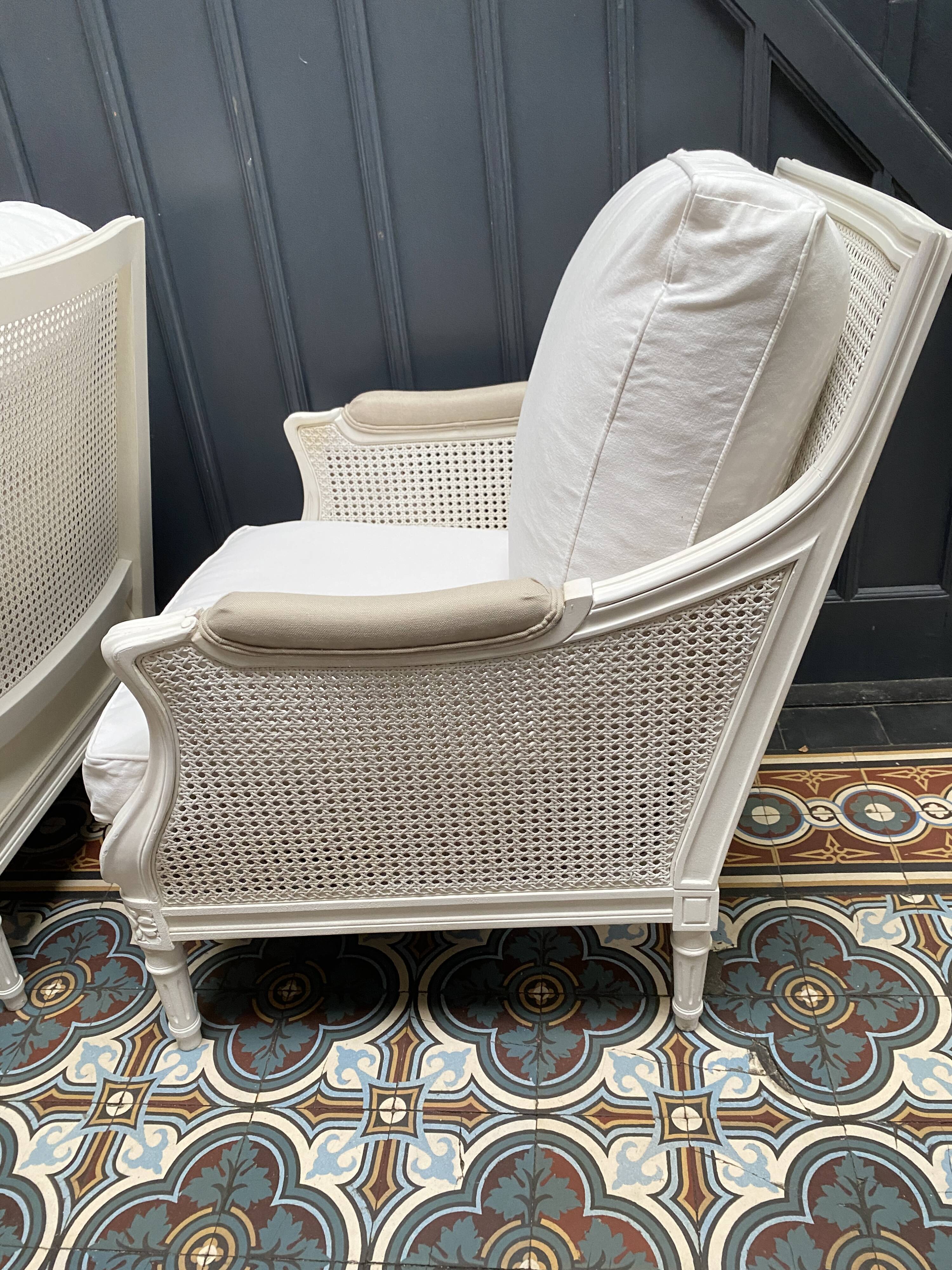 Pair of Louis XVI style caned Bergère armchairs