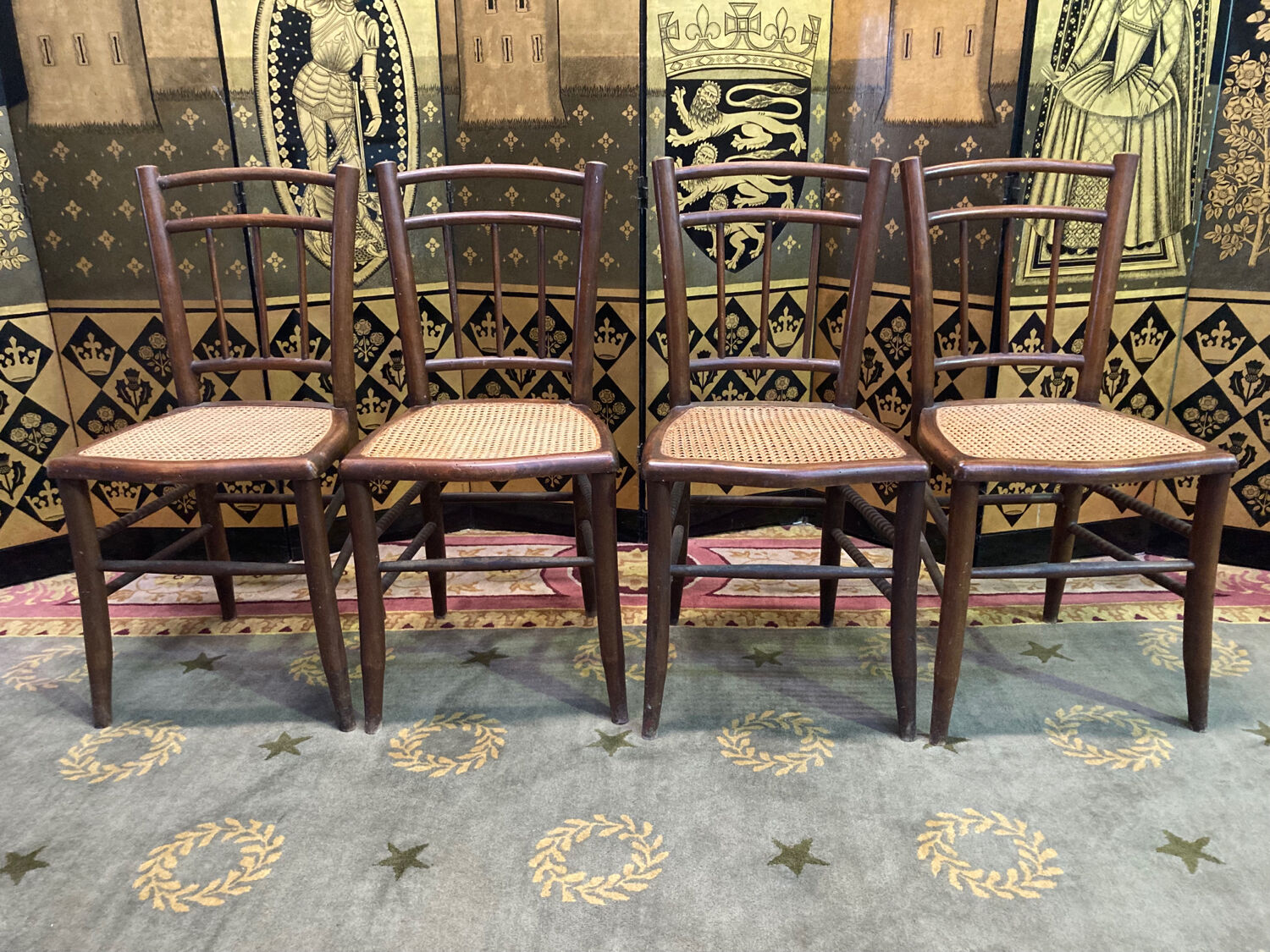 4 tanned bistro chairs