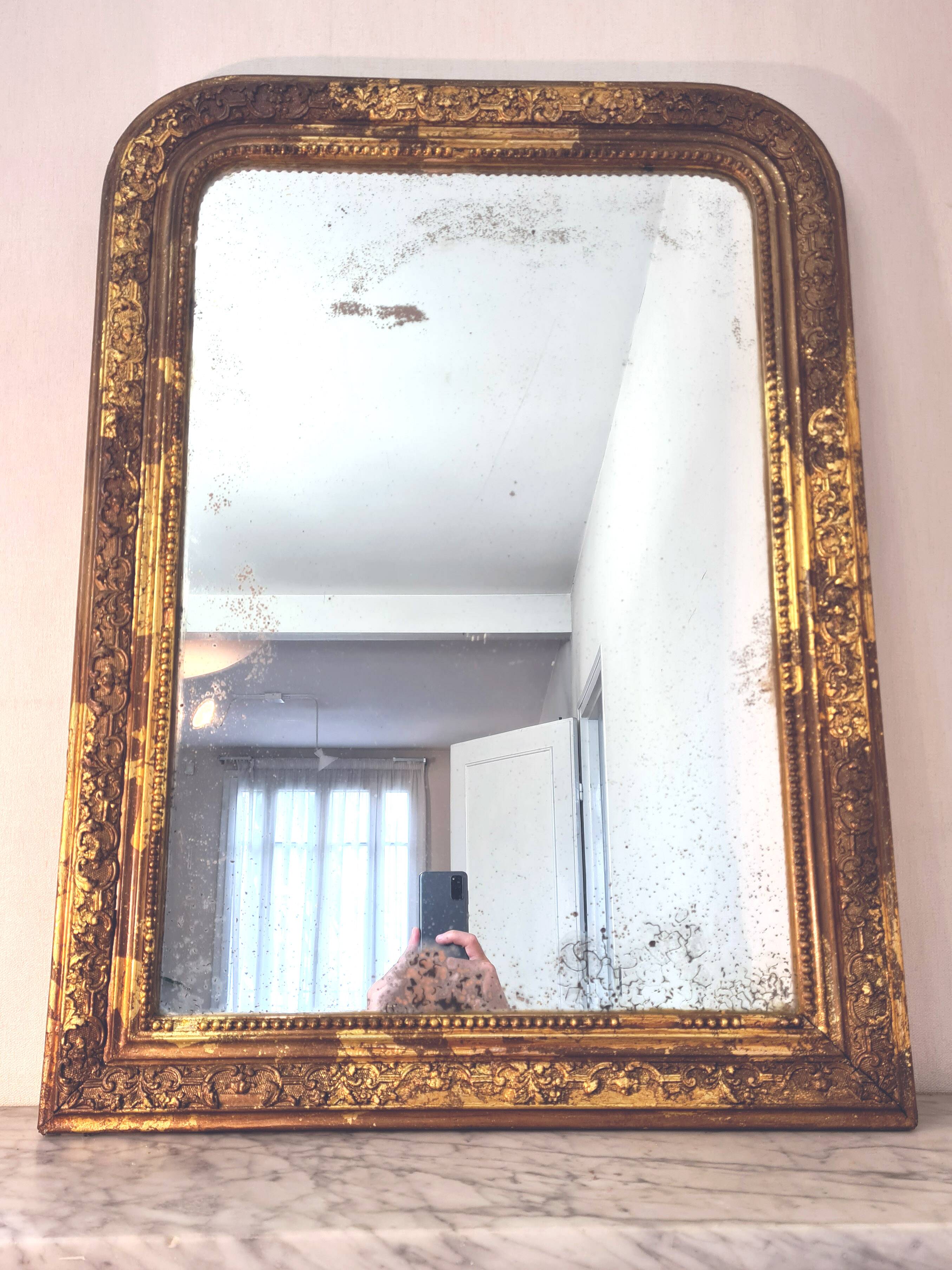 Old Louis Phillipe mercury mirror, in gilded stucco.