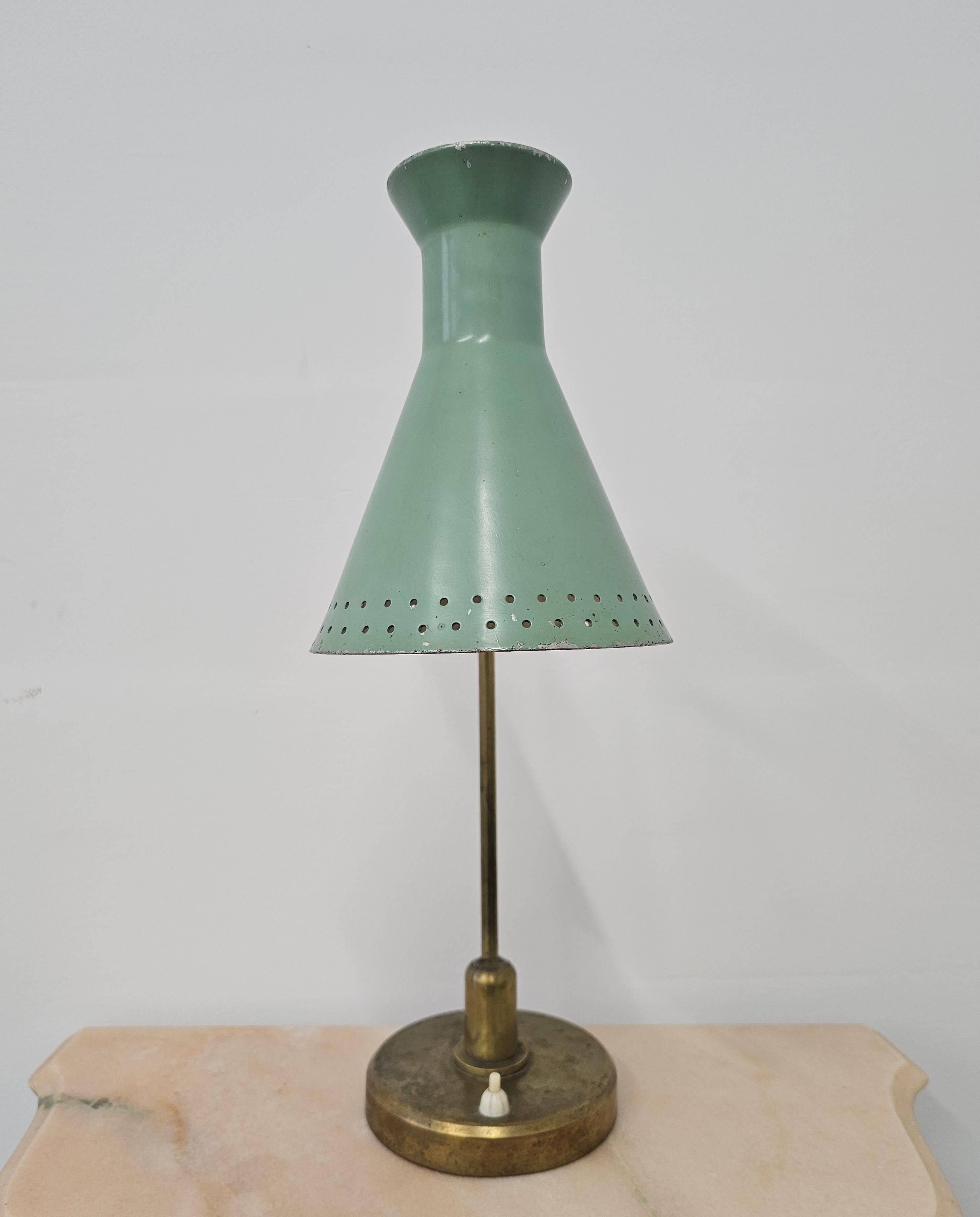 Mid-Century table lamp with a conical metal shade, attributed to Stilnovo.