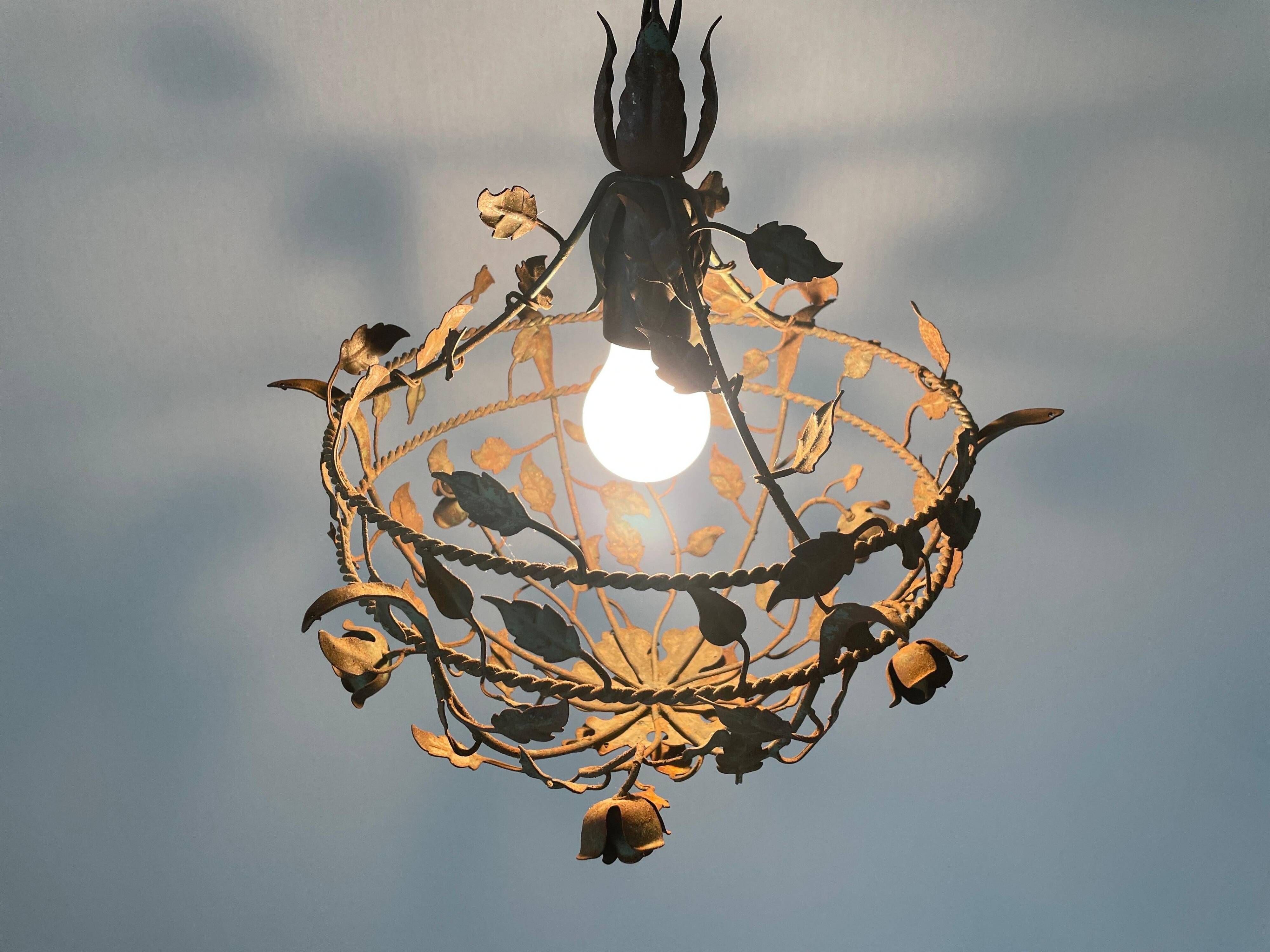 Patinated metal ceiling light with a floral and leaf pattern, 1950s, Italy.