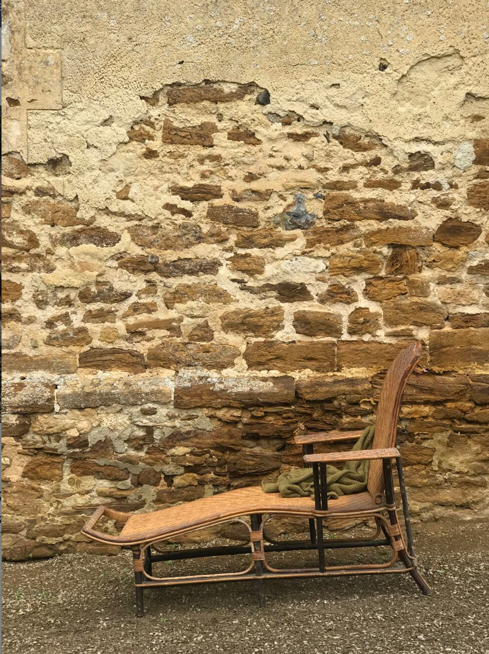 Old rattan lounger.