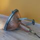 Old brass boat headlight with Holophane interior glass