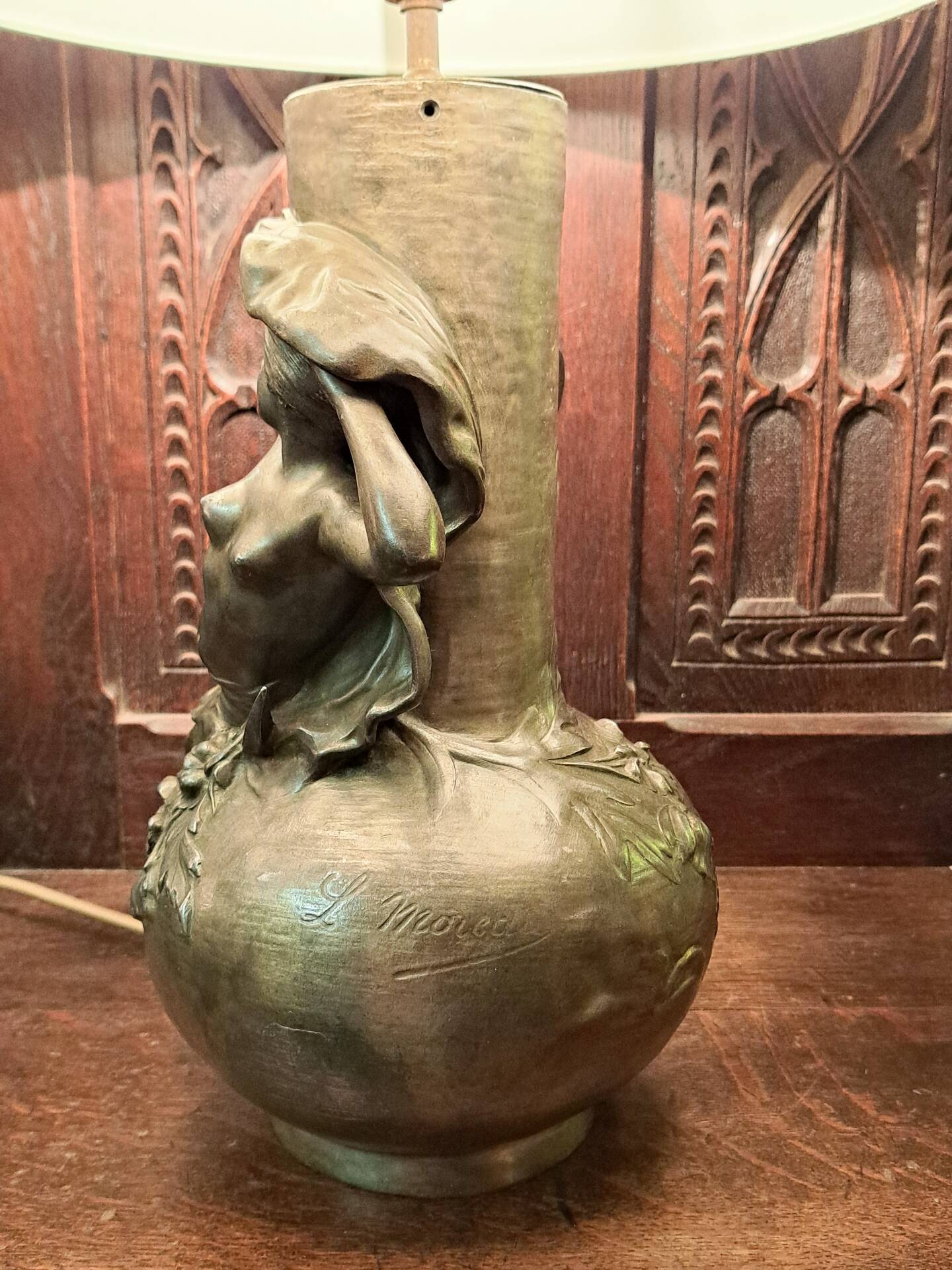 Lamp signed L. Moreau in brushed metal.