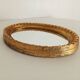 Miroir ovale italien vintage en bois doré