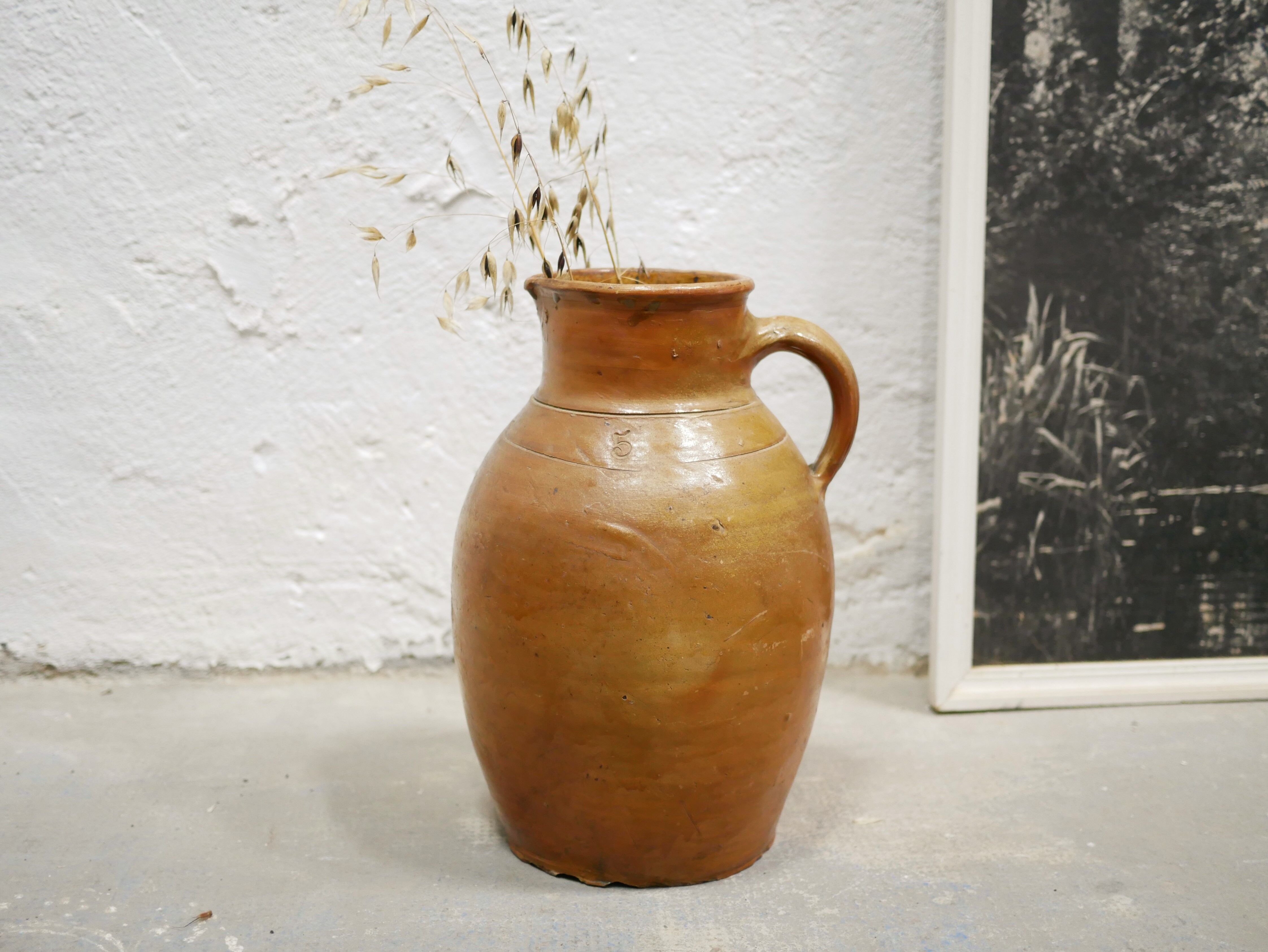 Pot à lait vintage en terre cuite vernissée