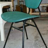 Chair in curved wood covered with vinyl, metal tube.