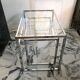 Nested tables in chrome metal and glass, Italy circa 1970.