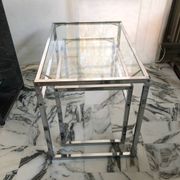 Nested tables in chrome metal and glass, Italy circa 1970.