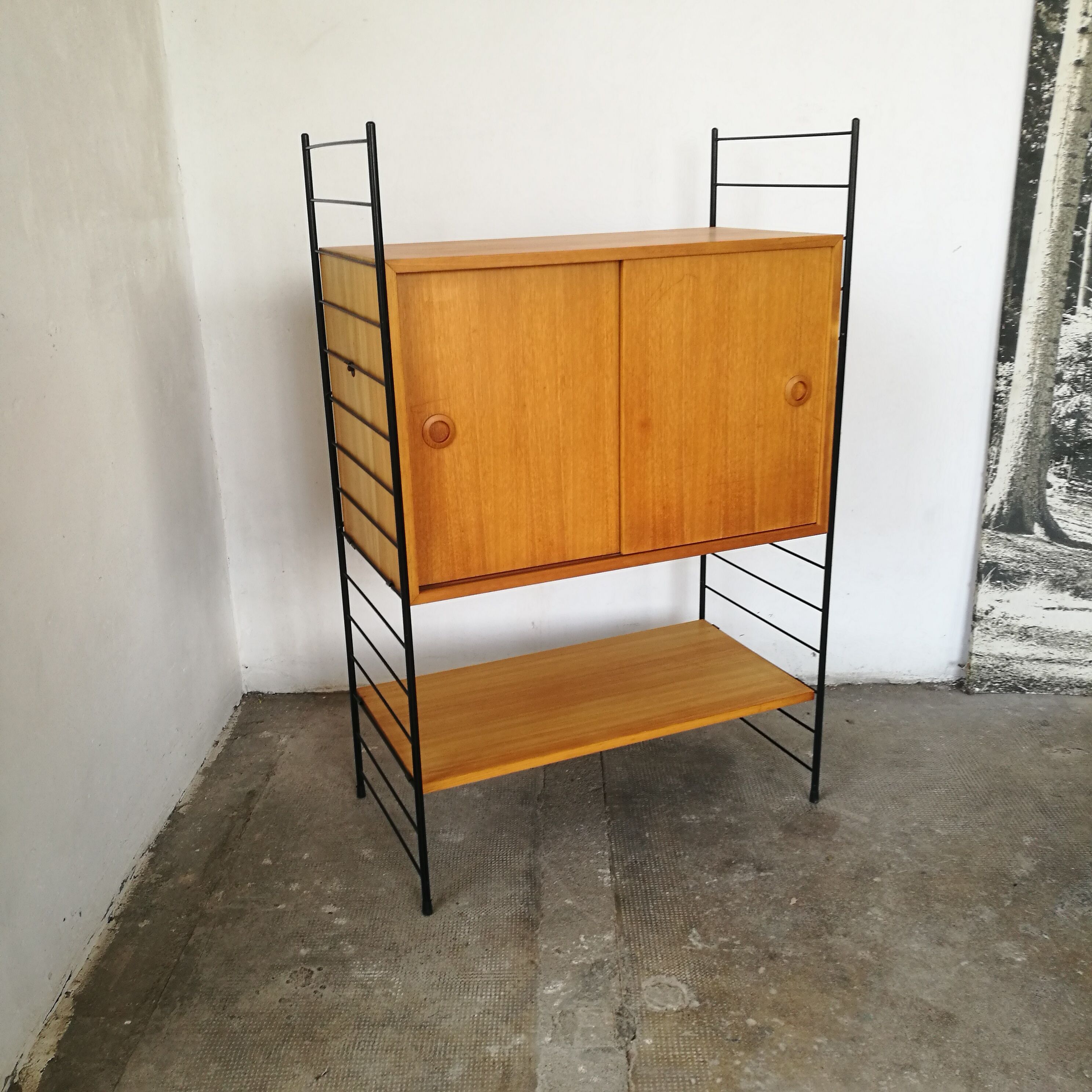 Scandinavian modular shelf with string scale