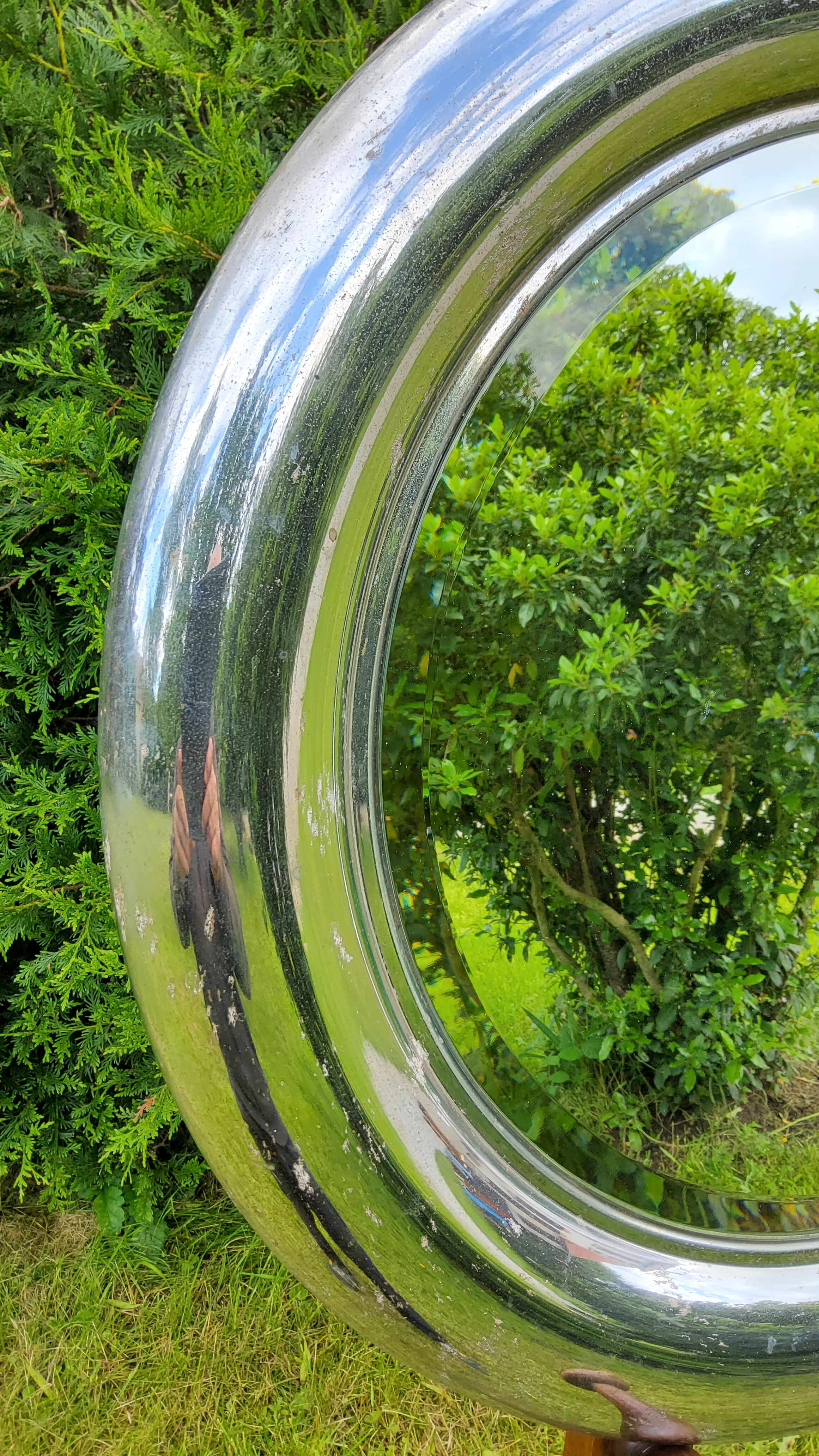 Round mirror of the 70s chromed by Reggiani Lampadari