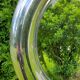Round mirror of the 70s chromed by Reggiani Lampadari
