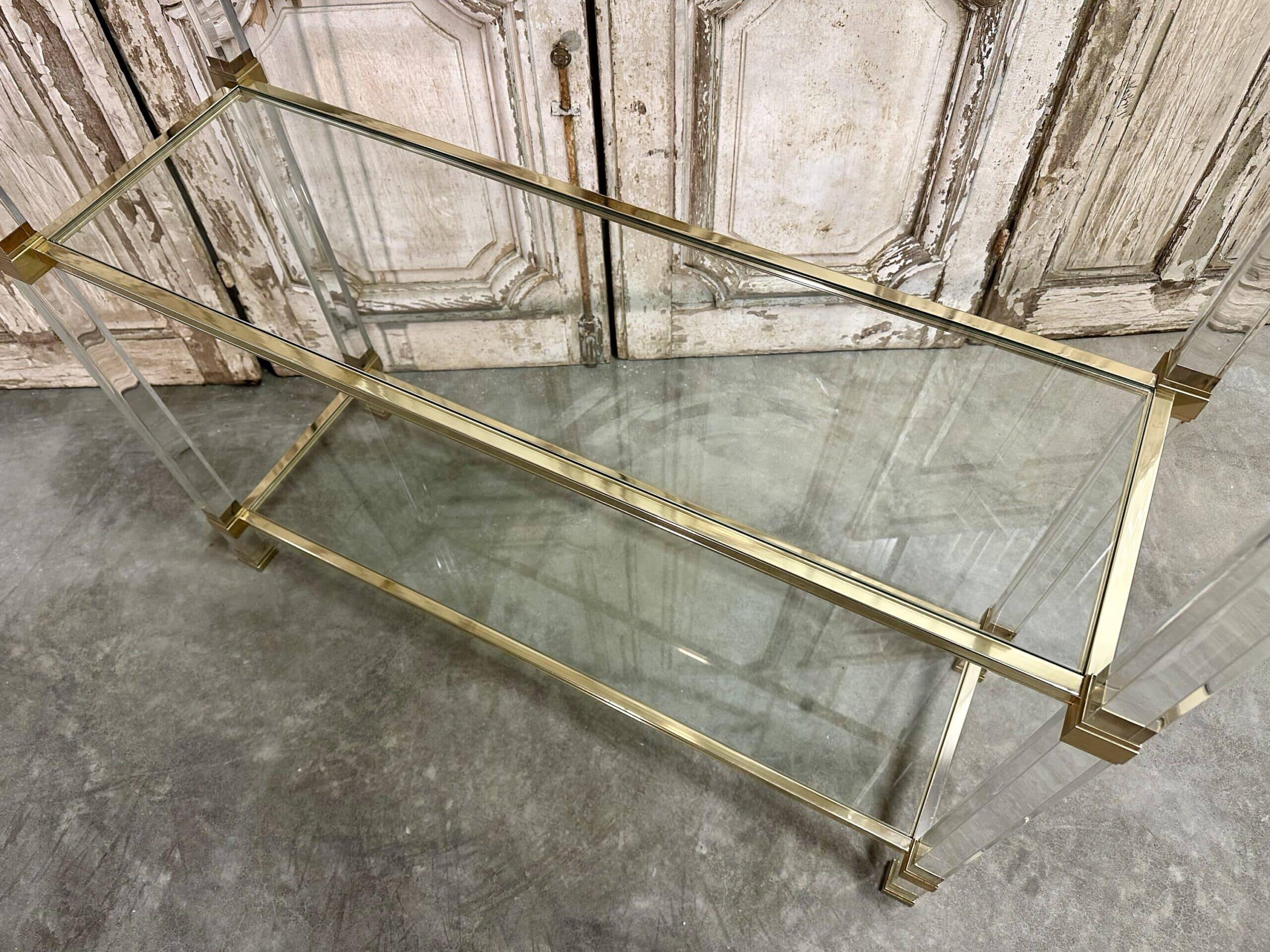 Plexiglass shelf by Pierre Vandel in Hollywood Regency style circa 1970.