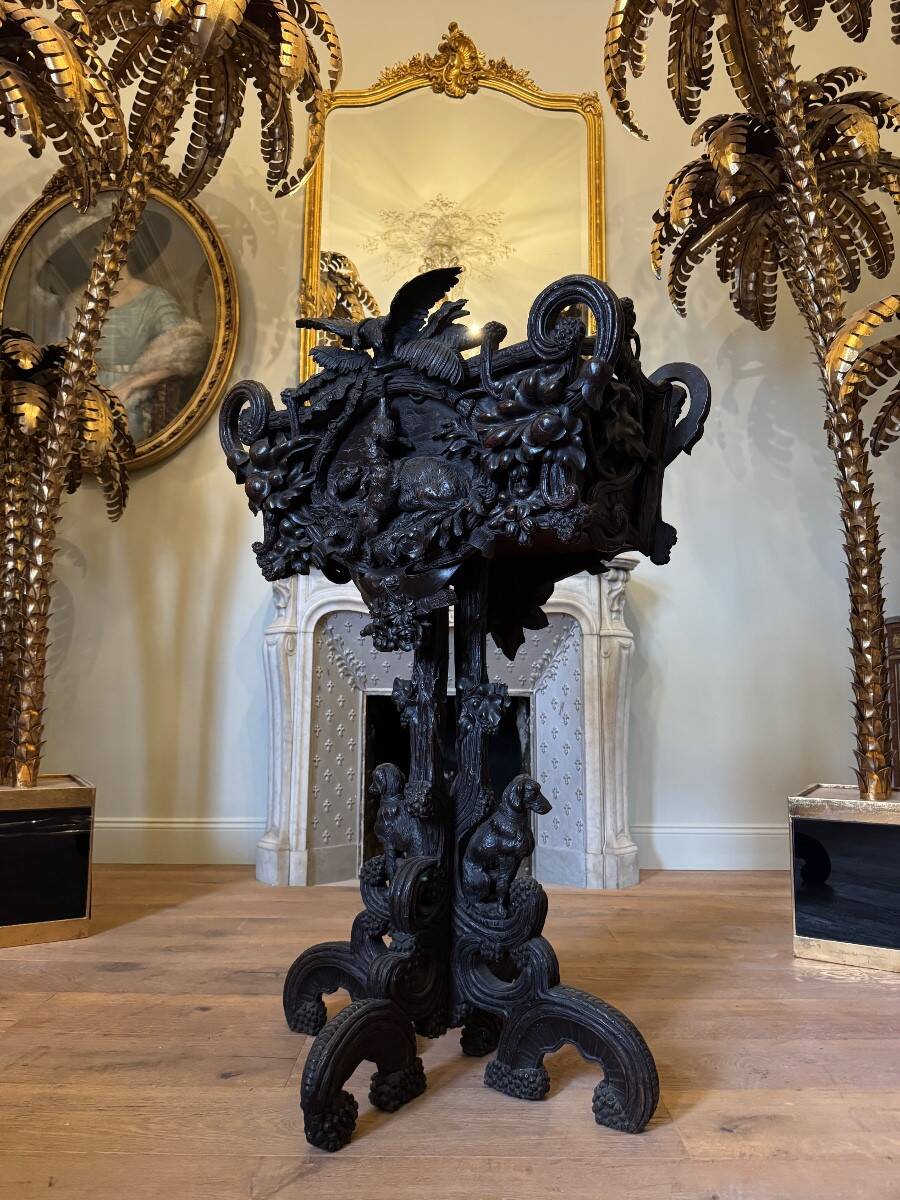Carved wooden jardinière, Black Forest work, 19th century.