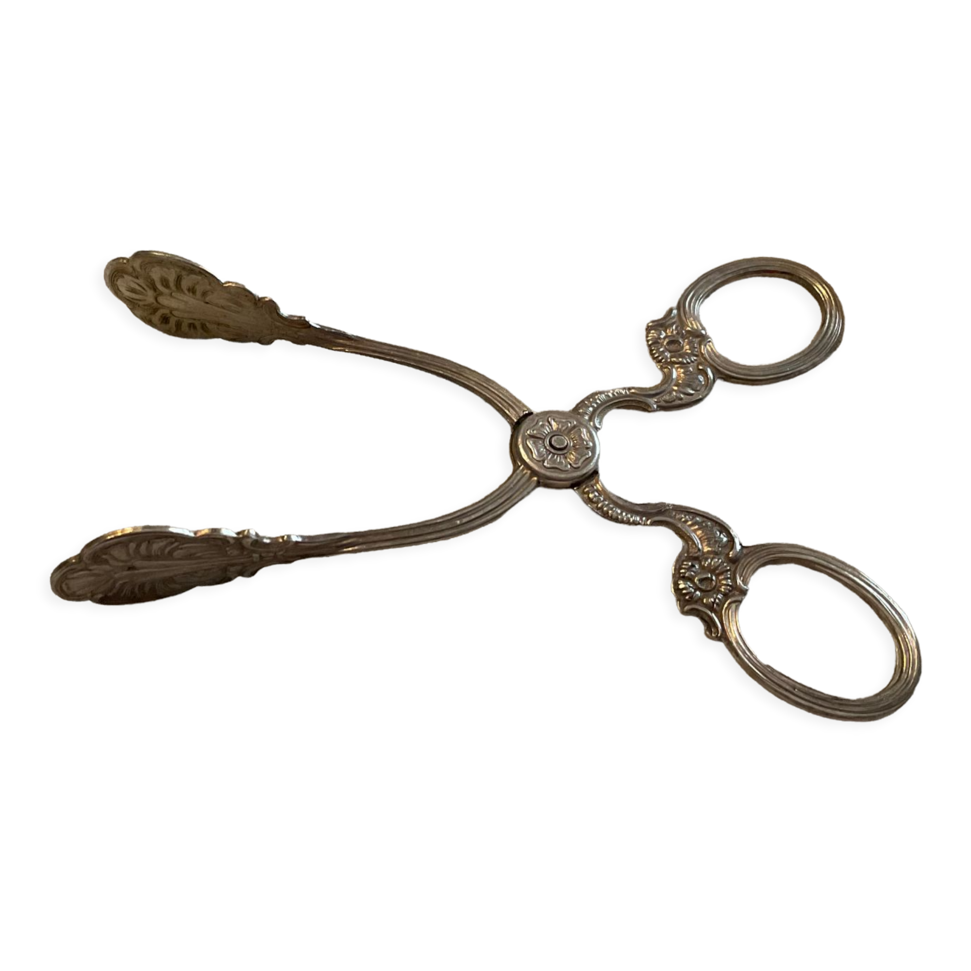 Sugar tongs or sweets in silver metal
