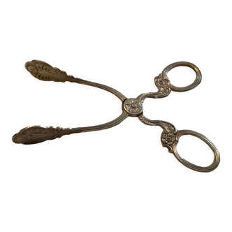 Sugar tongs or sweets in silver metal