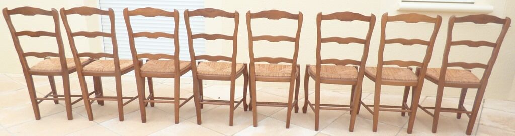 8 Straw chairs with high backs in solid wood