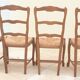 8 Straw chairs with high backs in solid wood