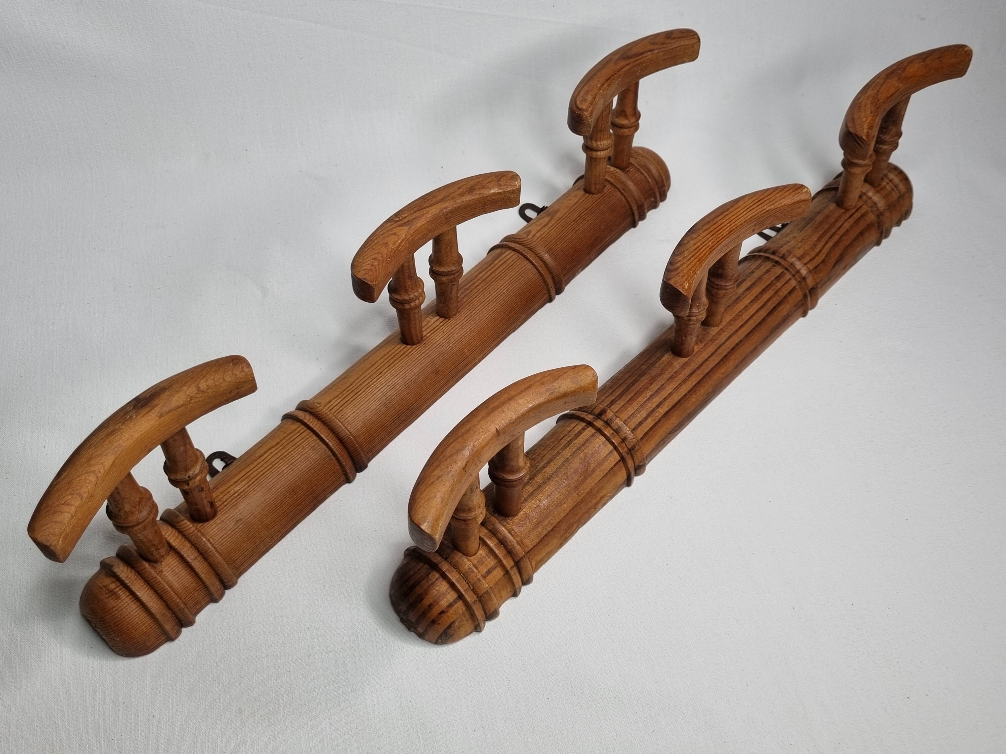 Pair of turned wooden coat racks in imitation of bamboo, 50 cm