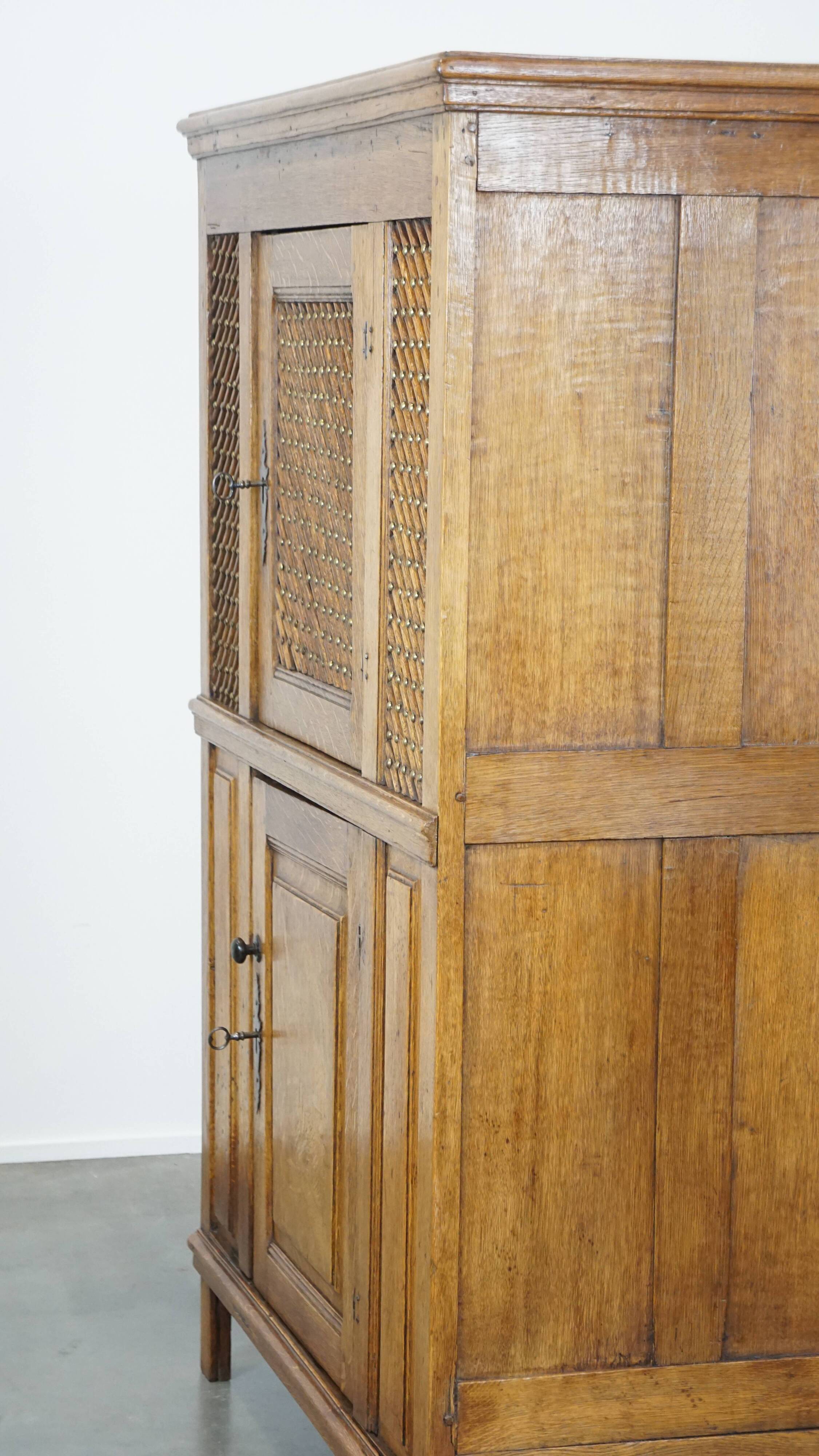 Antique oak bread cabinet from the late 17th century with working locks