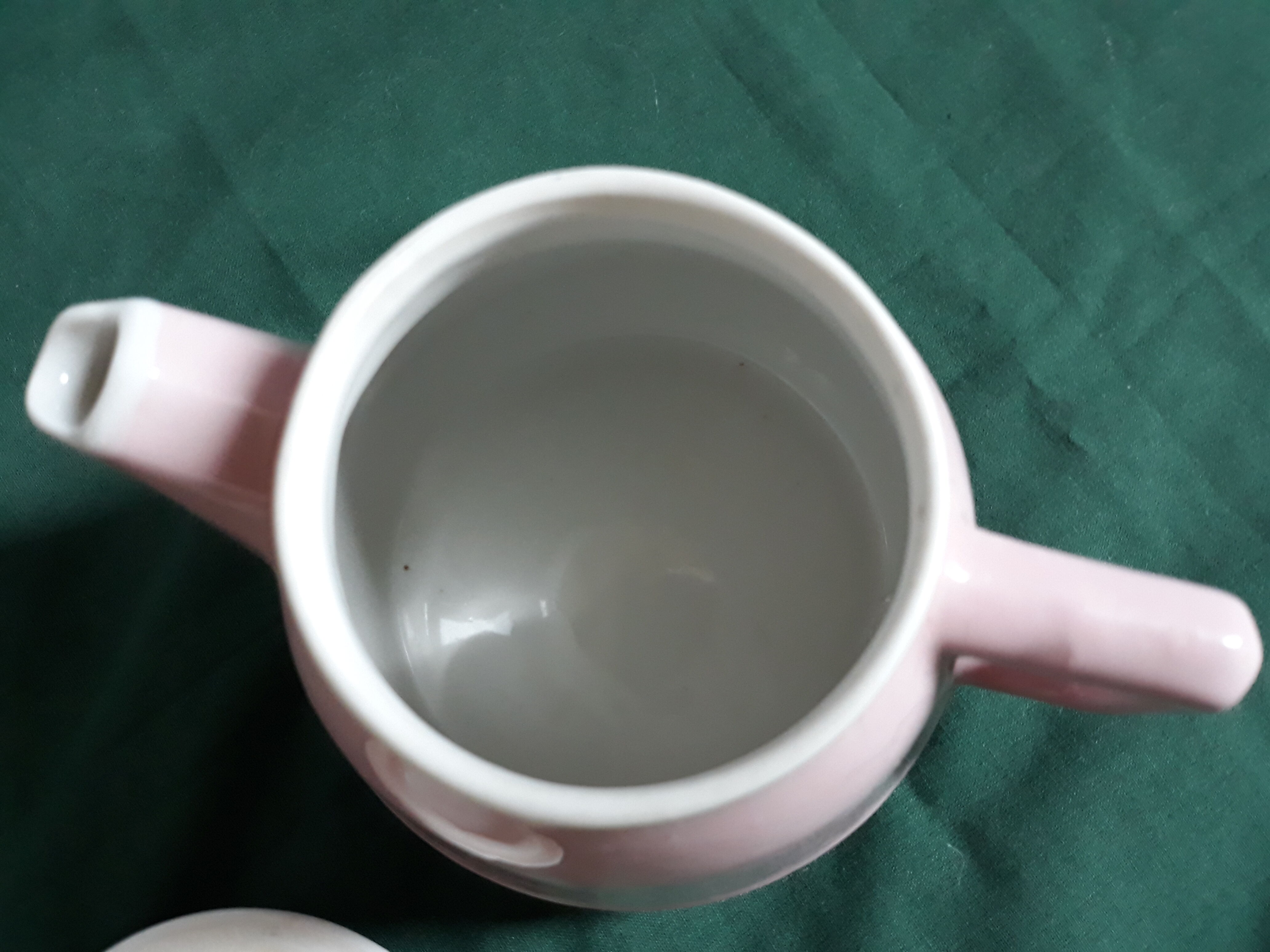 Old small pink teapot